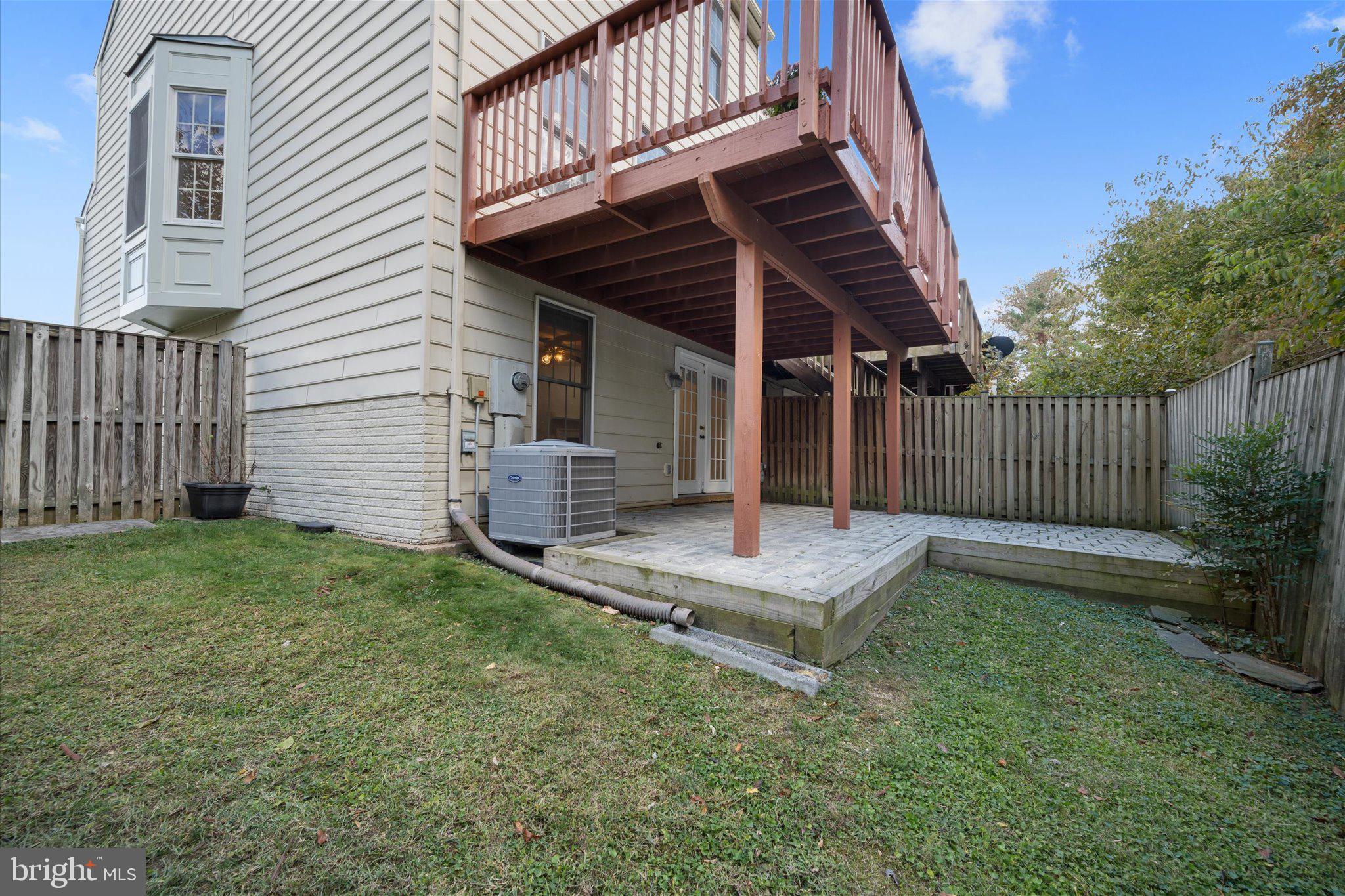 7849 Sabre Court Manassas, VA 20109 - Photo 34 of 35 a front view of house with wooden fence