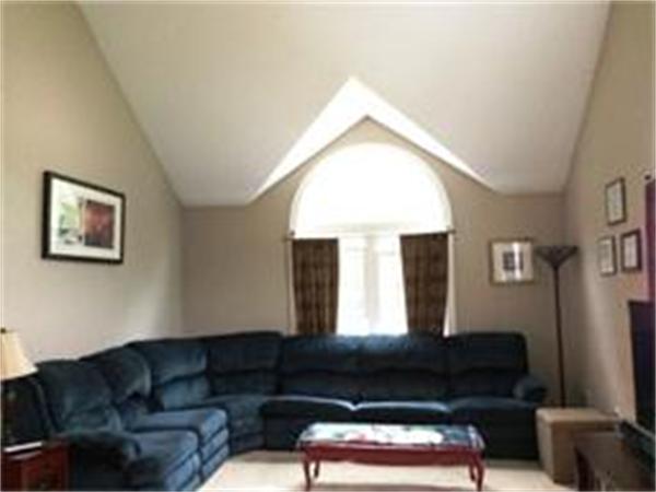 174 Northwest Road Spencer, MA 01562 - Photo 5 of 10 a living room with furniture and a window