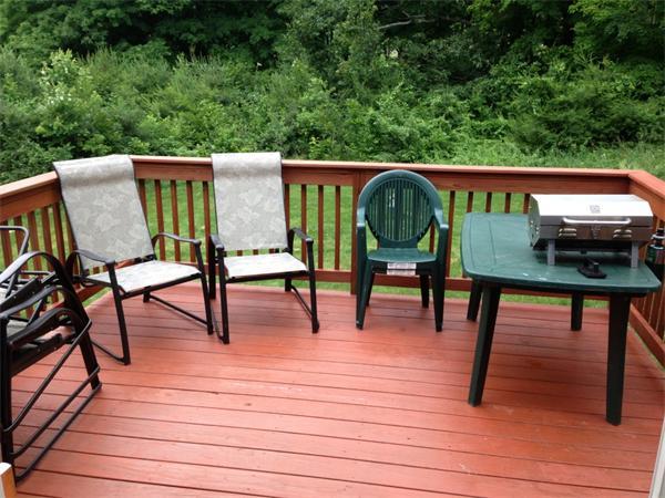 174 Northwest Road Spencer, MA 01562 - Photo 9 of 10 a view of a chairs and table on the roof deck