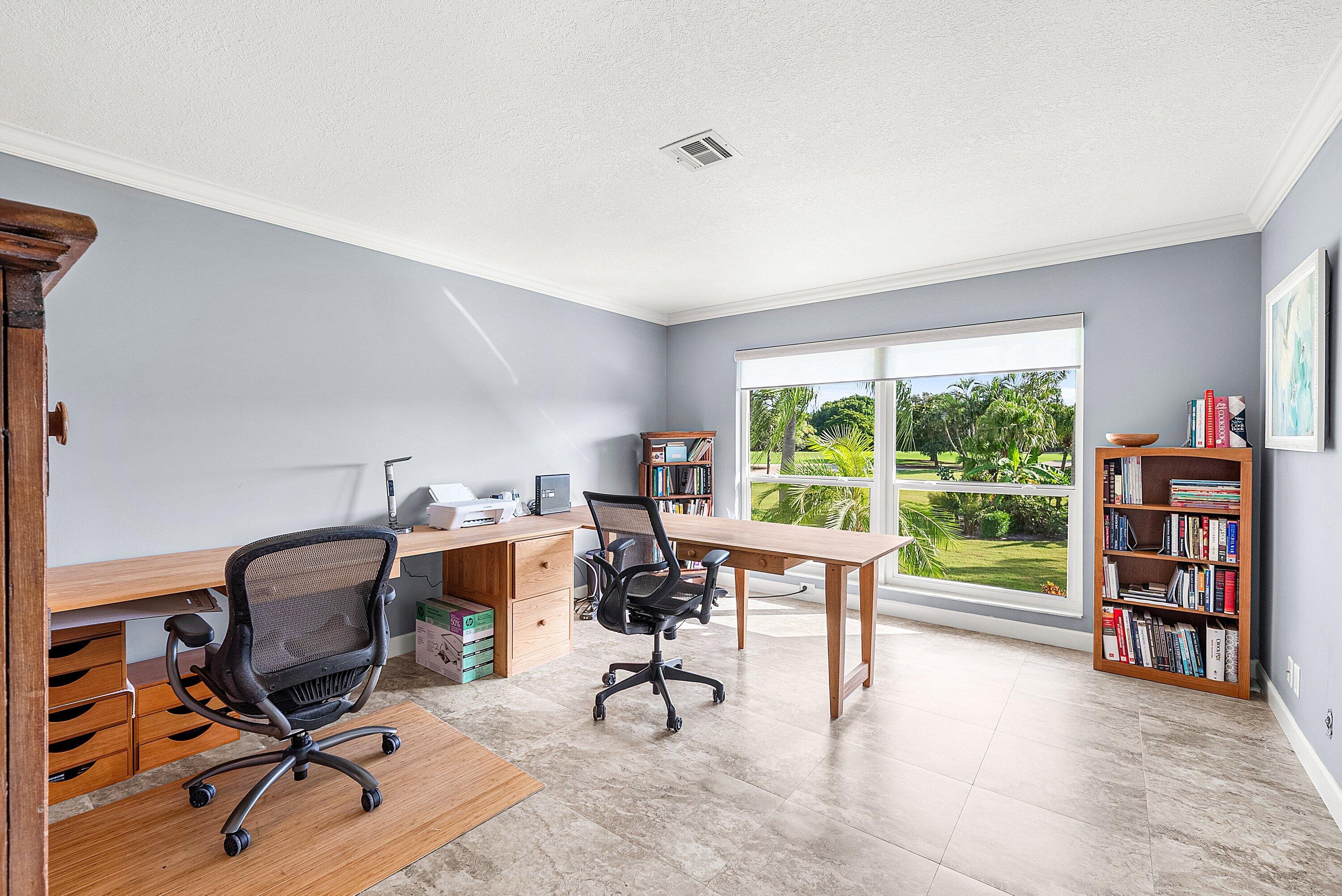 11212 Quail Covey Road, Unit GREEN HERON N Boynton Beach, FL 33436 - Photo 24 of 55 a view of a workspace with furniture and a window