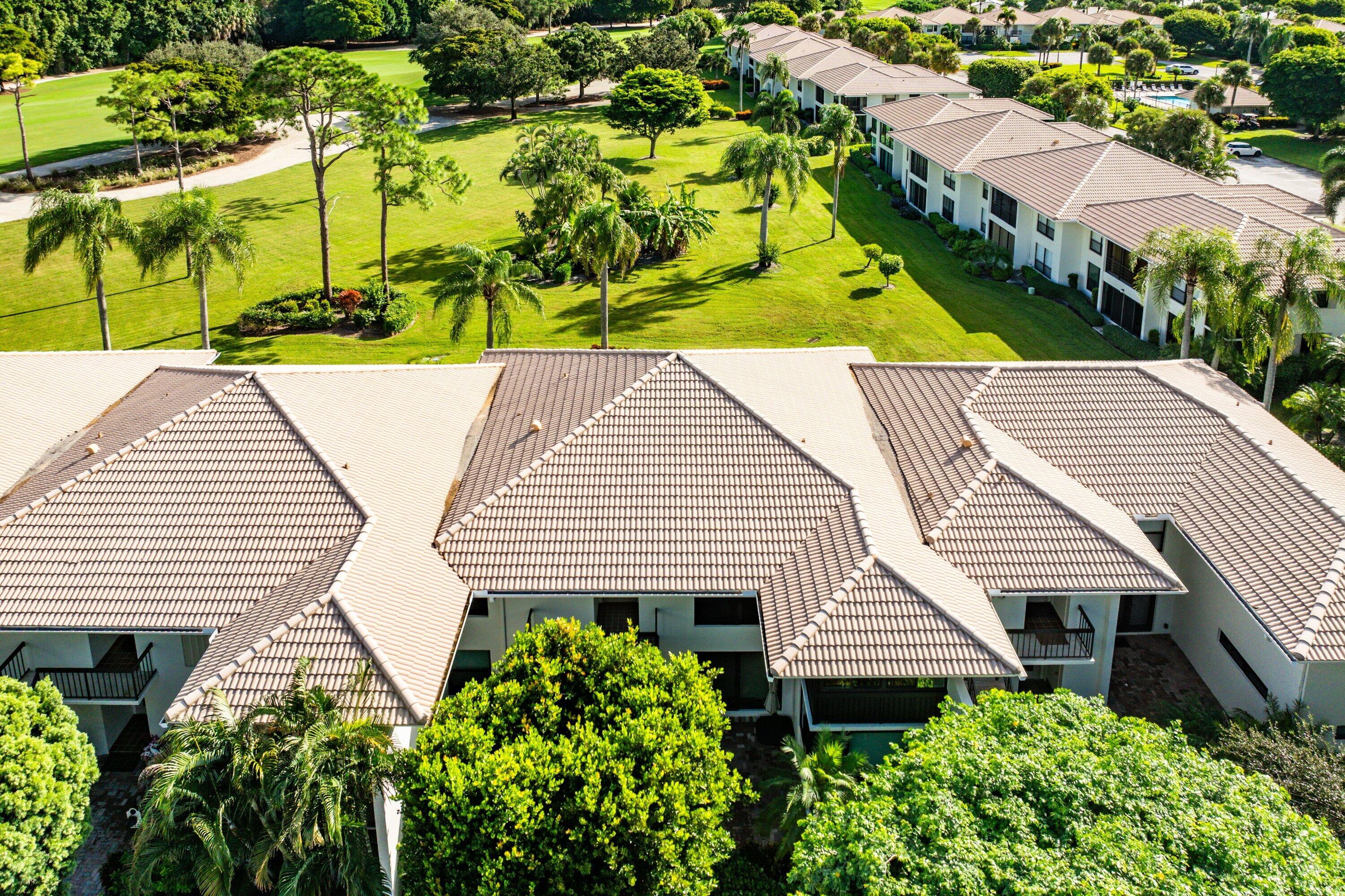 11212 Quail Covey Road, Unit GREEN HERON N Boynton Beach, FL 33436 - Photo 32 of 55 an aerial view of a house with a yard