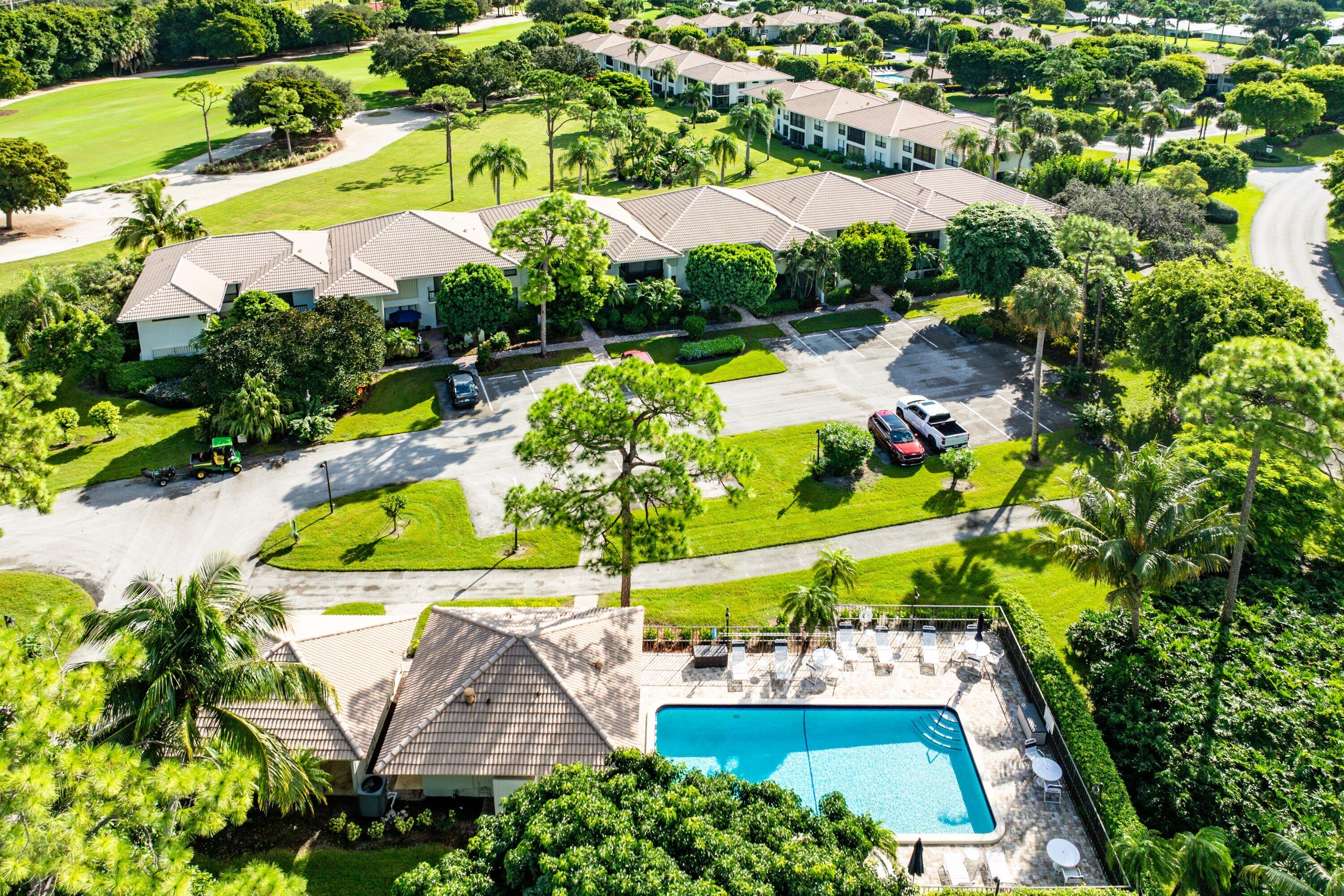 11212 Quail Covey Road, Unit GREEN HERON N Boynton Beach, FL 33436 - Photo 35 of 55 an aerial view of a house with a swimming pool yard and outdoor seating