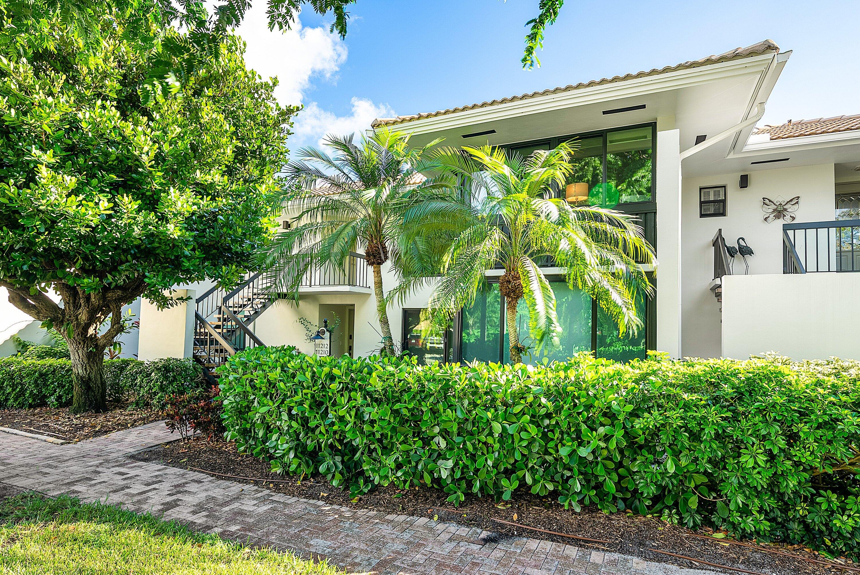 11212 Quail Covey Road, Unit GREEN HERON N Boynton Beach, FL 33436 - Photo 43 of 55 front view of a house