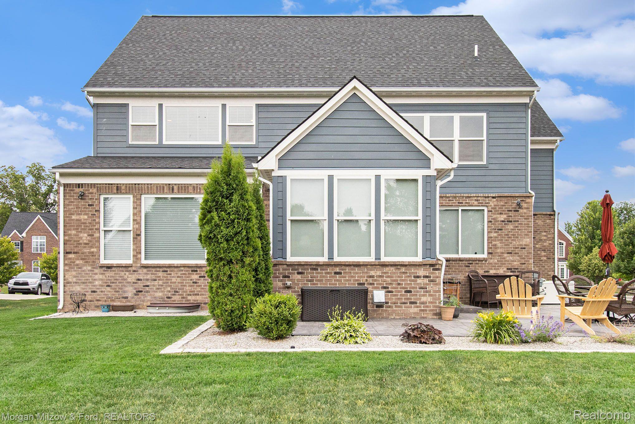 4557 Oakhurst Ridge Road Clarkston, MI 48348 - Photo 29 of 42 Loads of room for gatherings & play!