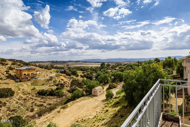 a view of a city from a balcony