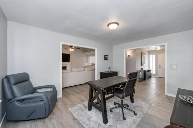 a workspace with furniture and window