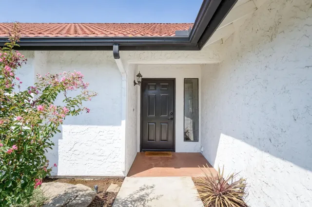 a front view of a house with a garage