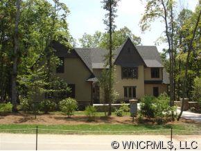 150 Valley Springs Road Asheville, NC 28803 - Photo 1 of 6 a front view of a house with garden