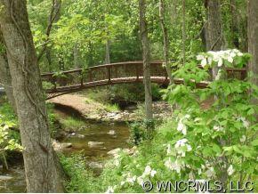 150 Valley Springs Road Asheville, NC 28803 - Photo 2 of 6 a view of a yard