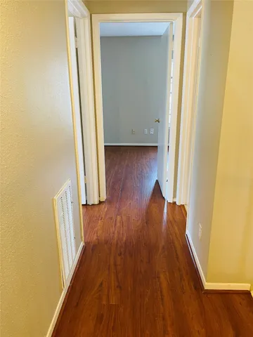 a view of entryway with wooden floor