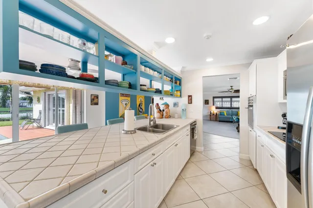 $875,000 | 8415 Pine Tree Lane, Lake Clarke Shores, FL 33406