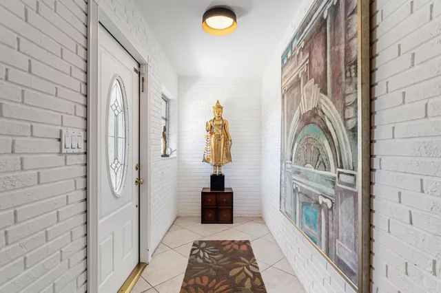 $875,000 | 8415 Pine Tree Lane, Lake Clarke Shores, FL 33406