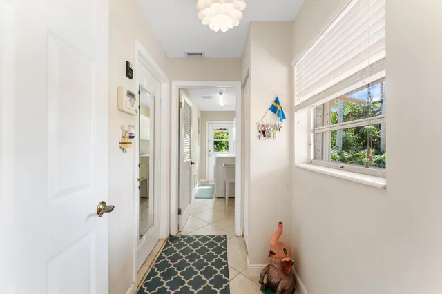 $875,000 | 8415 Pine Tree Lane, Lake Clarke Shores, FL 33406