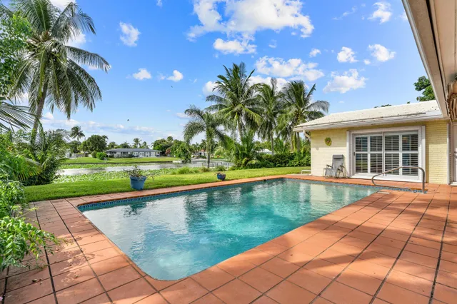 $875,000 | 8415 Pine Tree Lane, Lake Clarke Shores, FL 33406