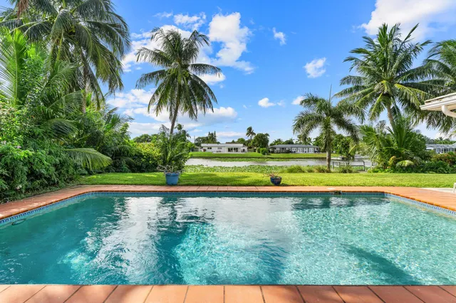 $875,000 | 8415 Pine Tree Lane, Lake Clarke Shores, FL 33406