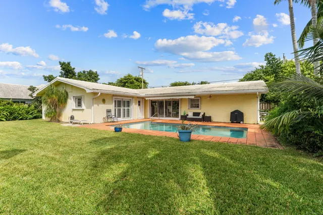 $875,000 | 8415 Pine Tree Lane, Lake Clarke Shores, FL 33406