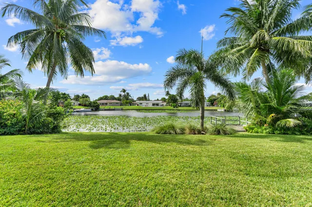 $875,000 | 8415 Pine Tree Lane, Lake Clarke Shores, FL 33406