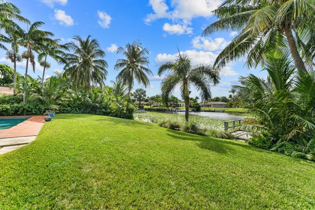 $875,000 | 8415 Pine Tree Lane, Lake Clarke Shores, FL 33406