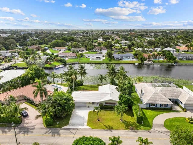 $875,000 | 8415 Pine Tree Lane, Lake Clarke Shores, FL 33406