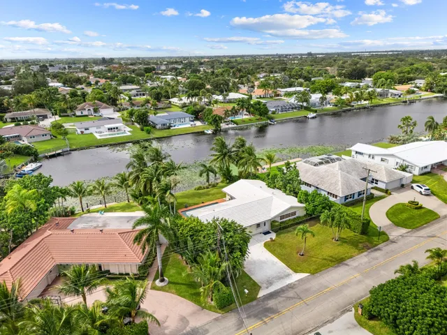 $875,000 | 8415 Pine Tree Lane, Lake Clarke Shores, FL 33406