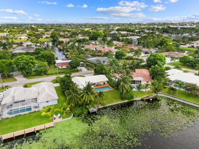 $875,000 | 8415 Pine Tree Lane, Lake Clarke Shores, FL 33406