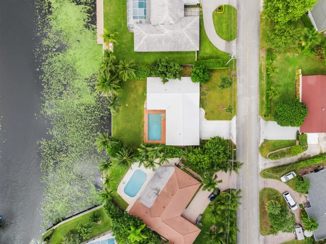 $875,000 | 8415 Pine Tree Lane, Lake Clarke Shores, FL 33406