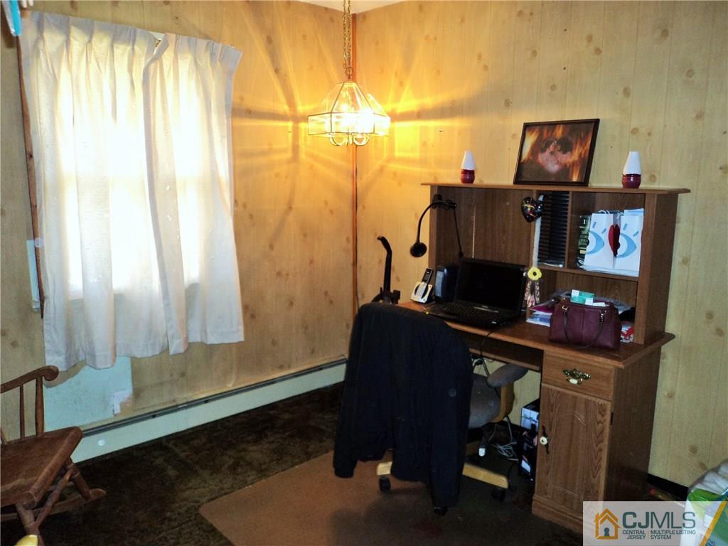 20 Brookville Road Edison, NJ 08817 - Photo 8 of 13 a room with furniture and window