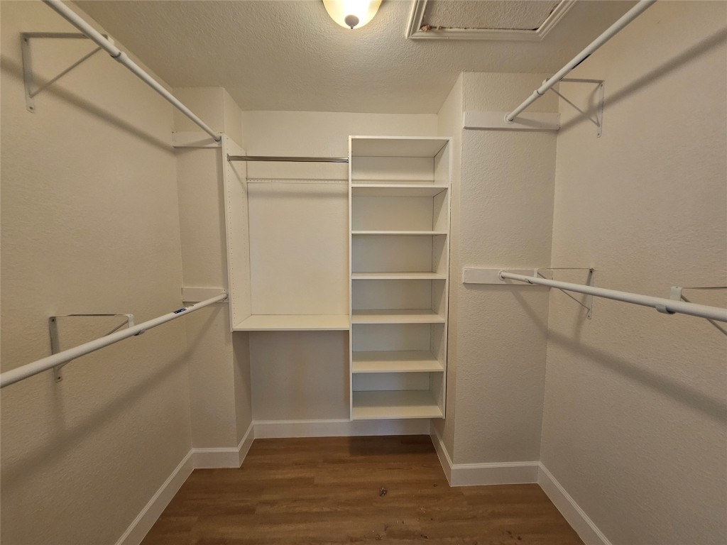 1201 Deer Grove Drive Cedar Park, TX 78613 - Photo 22 of 35 a view of walk in closet with empty racks