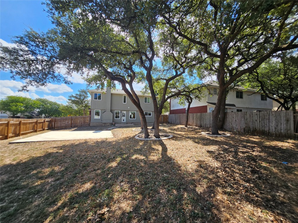 1201 Deer Grove Drive Cedar Park, TX 78613 - Photo 32 of 35 a view of a yard with a tree