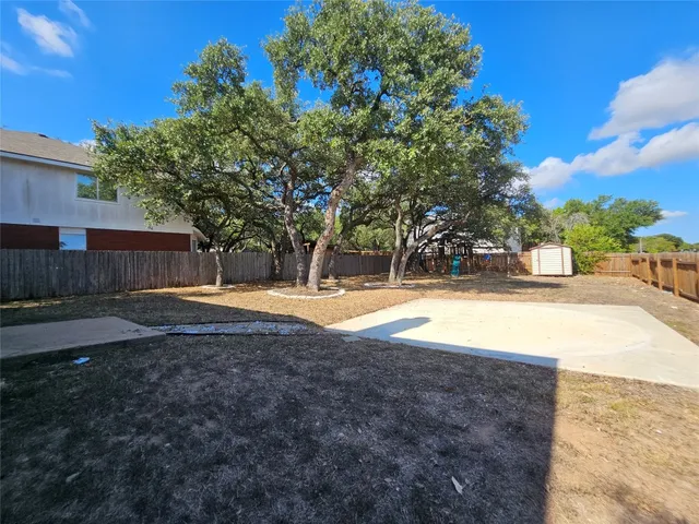 a view of swimming pool with a yard