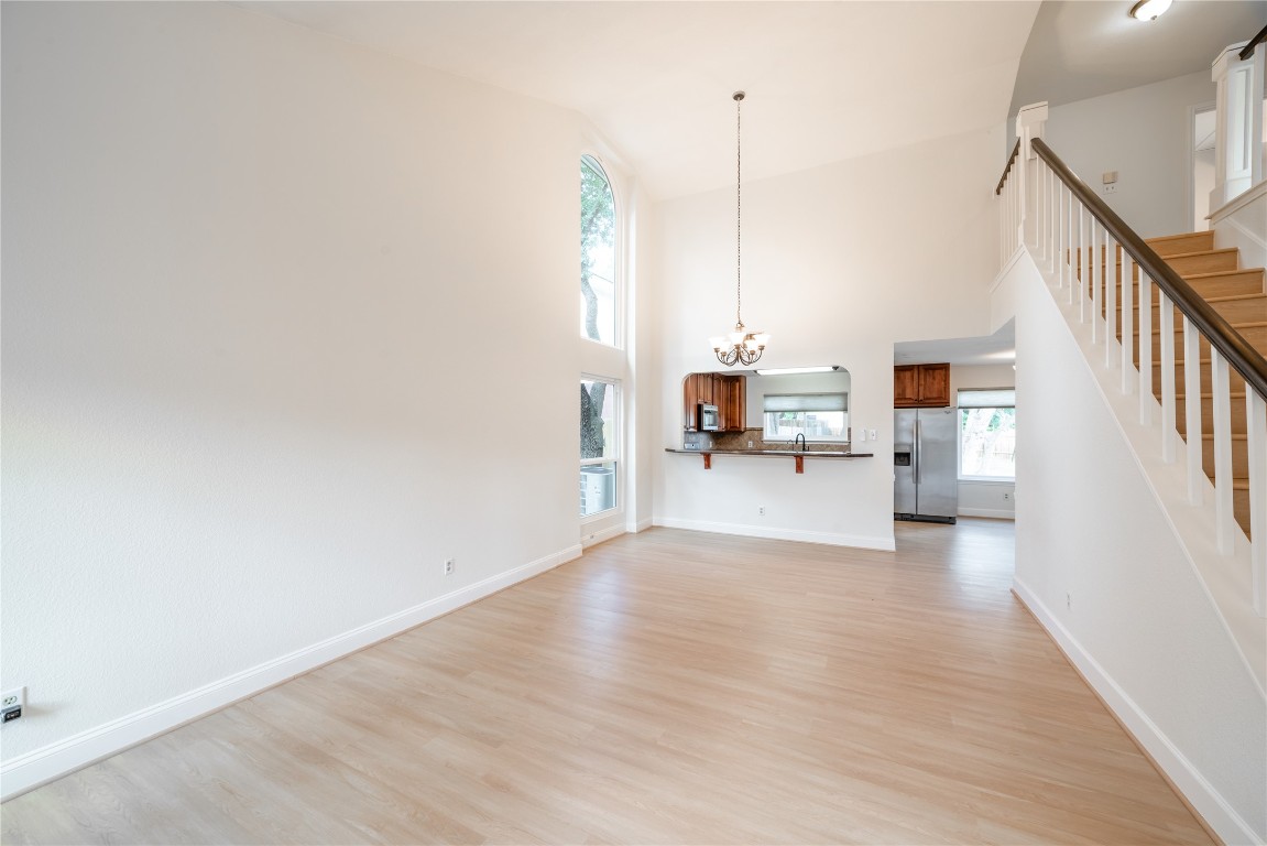 1201 Deer Grove Drive Cedar Park, TX 78613 - Photo 5 of 35 a view of a living room with wooden floor