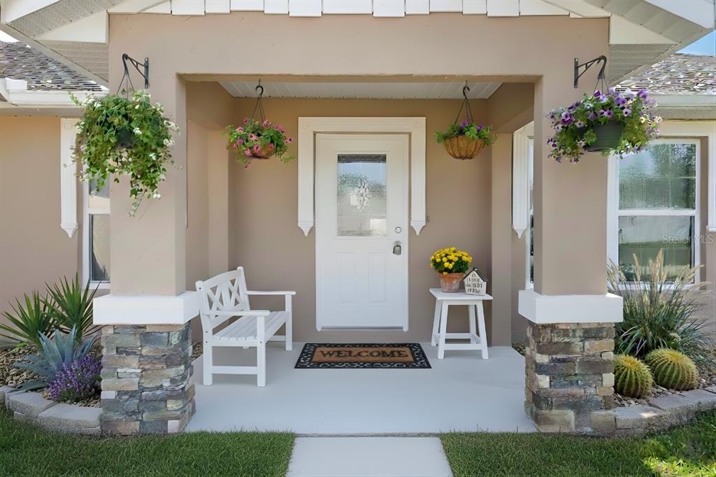 1 Pecan Course Circle Ocala, FL 34472 - Photo 4 of 24 a front view of a house with outdoor seating