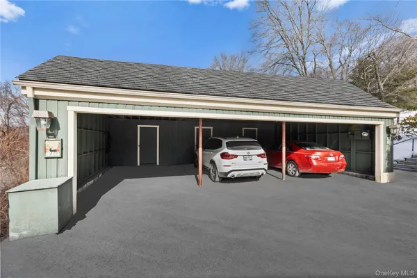 a car parked in front of garage
