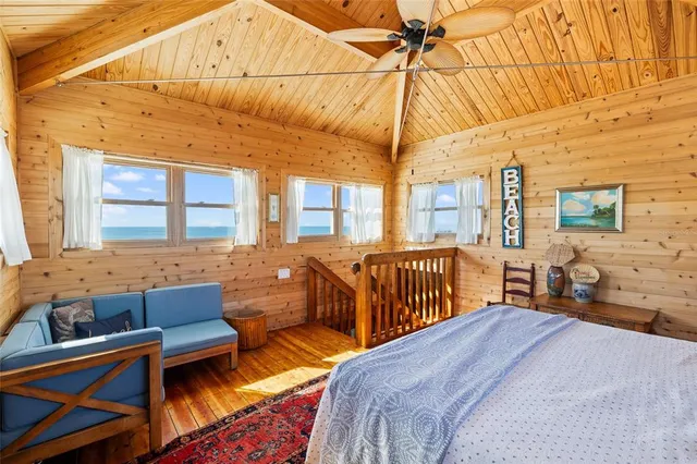 a outdoor space with patio the couches and pool table with chairs