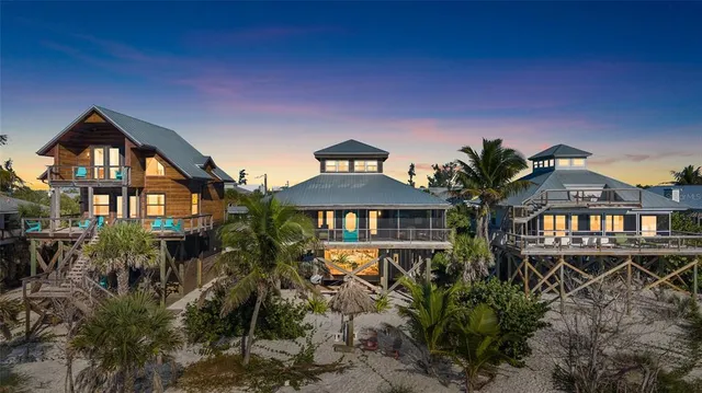 a view of a chairs and table in patio
