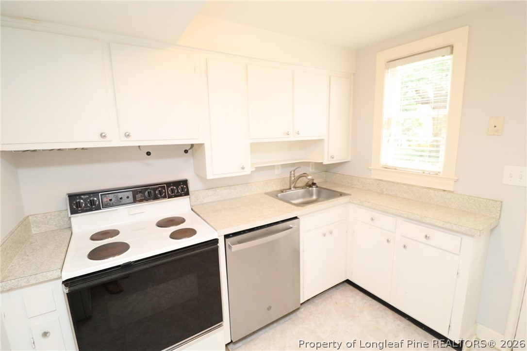 1000 Nichols Drive Raleigh, NC 27605 - Photo 9 of 22 a utility room with dryer and washer