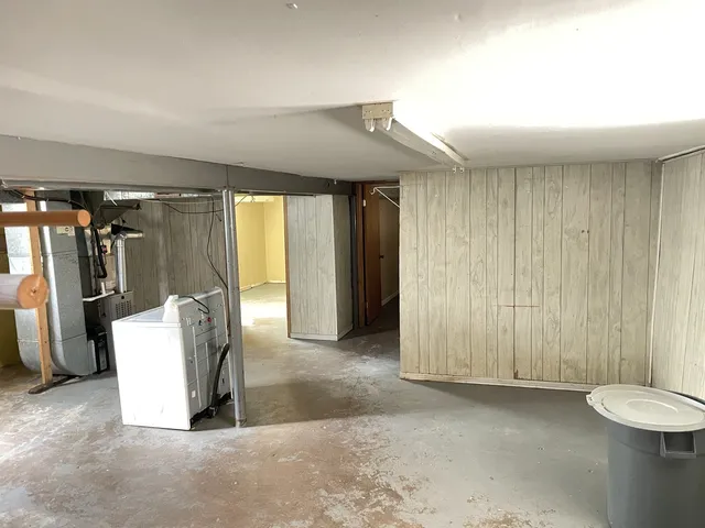 a view of a livingroom with furniture and closet