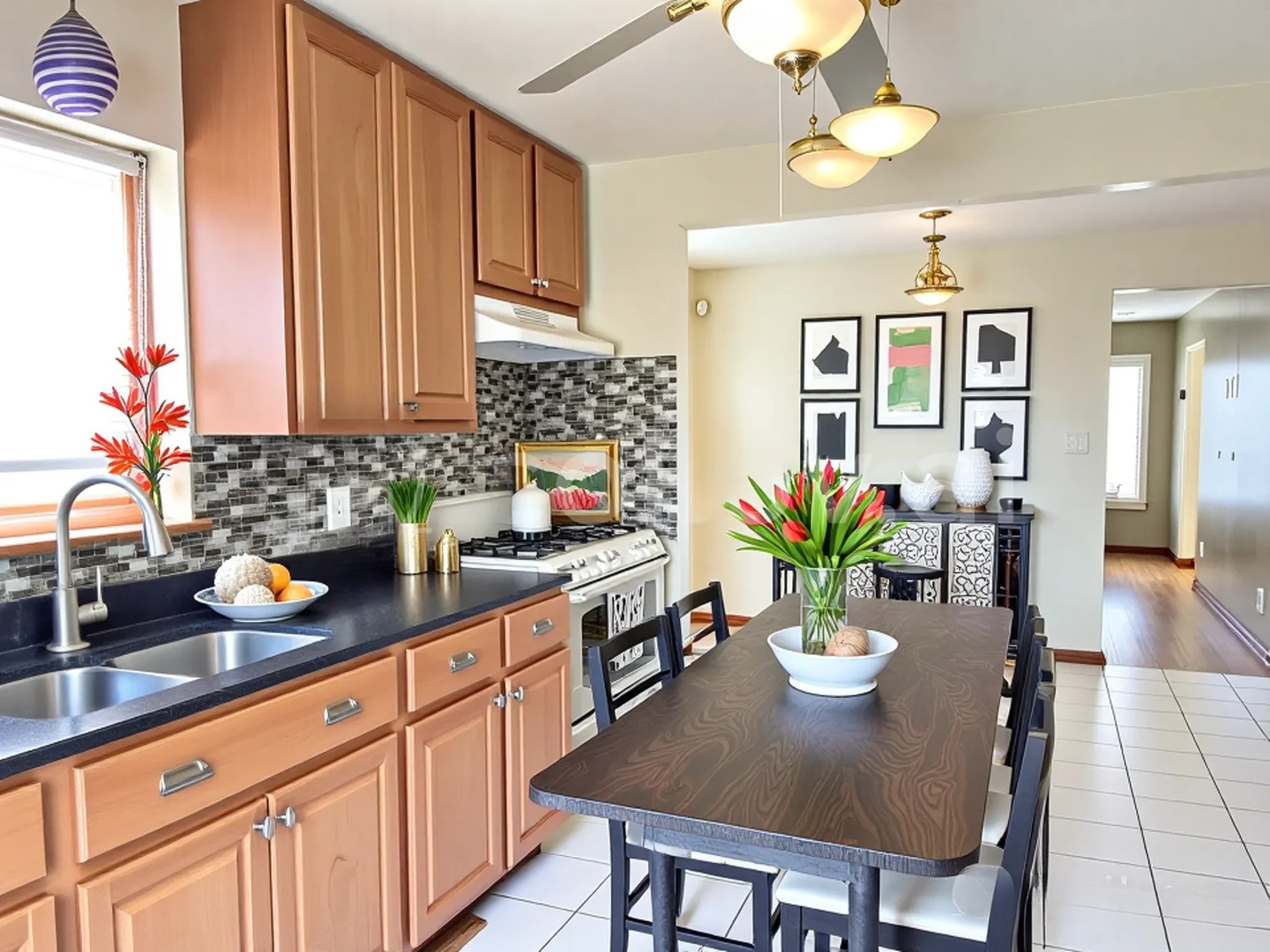 3909 West 71st Street Chicago, IL 60629 - Photo 9 of 16 a kitchen with a table and chairs in it