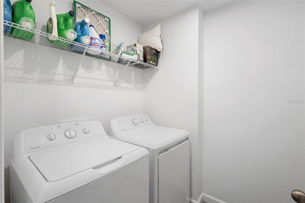 866 Spring Palms Loop Orlando, FL 32828 - Photo 19 of 26 a utility room with dryer and washer