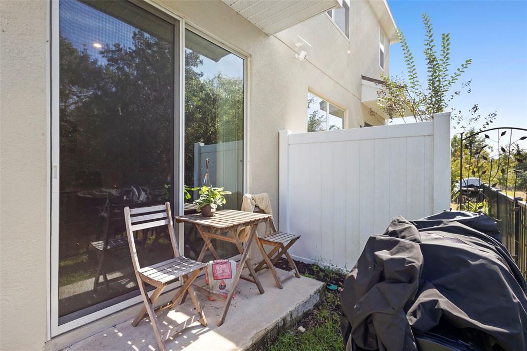 866 Spring Palms Loop Orlando, FL 32828 - Photo 20 of 26 a view of a workspace with furniture