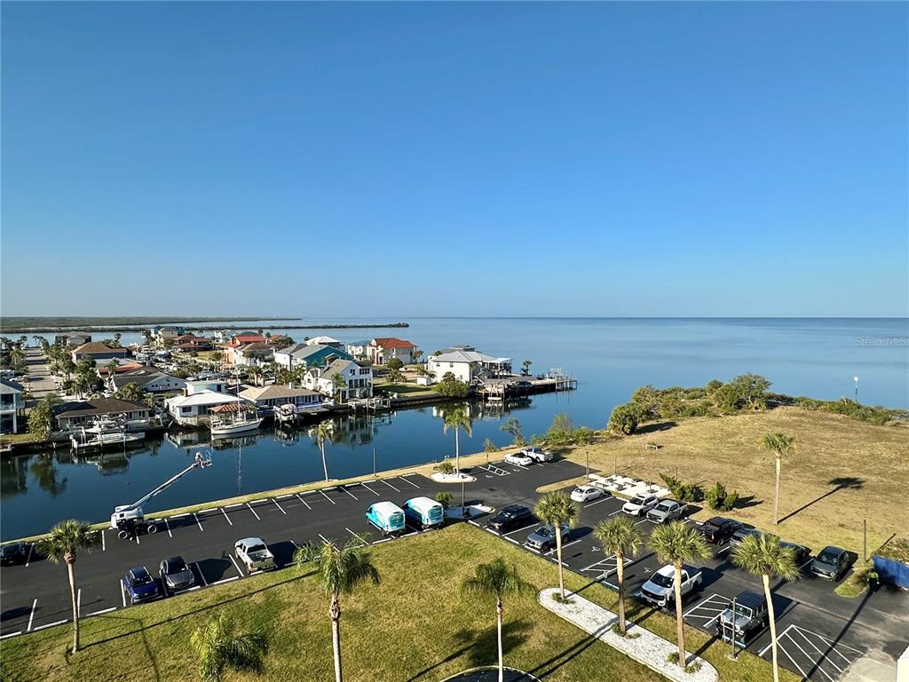5915 Sea Ranch Drive, Unit 711 Hudson, FL 34667 - Photo 27 of 85 a view of an ocean and beach