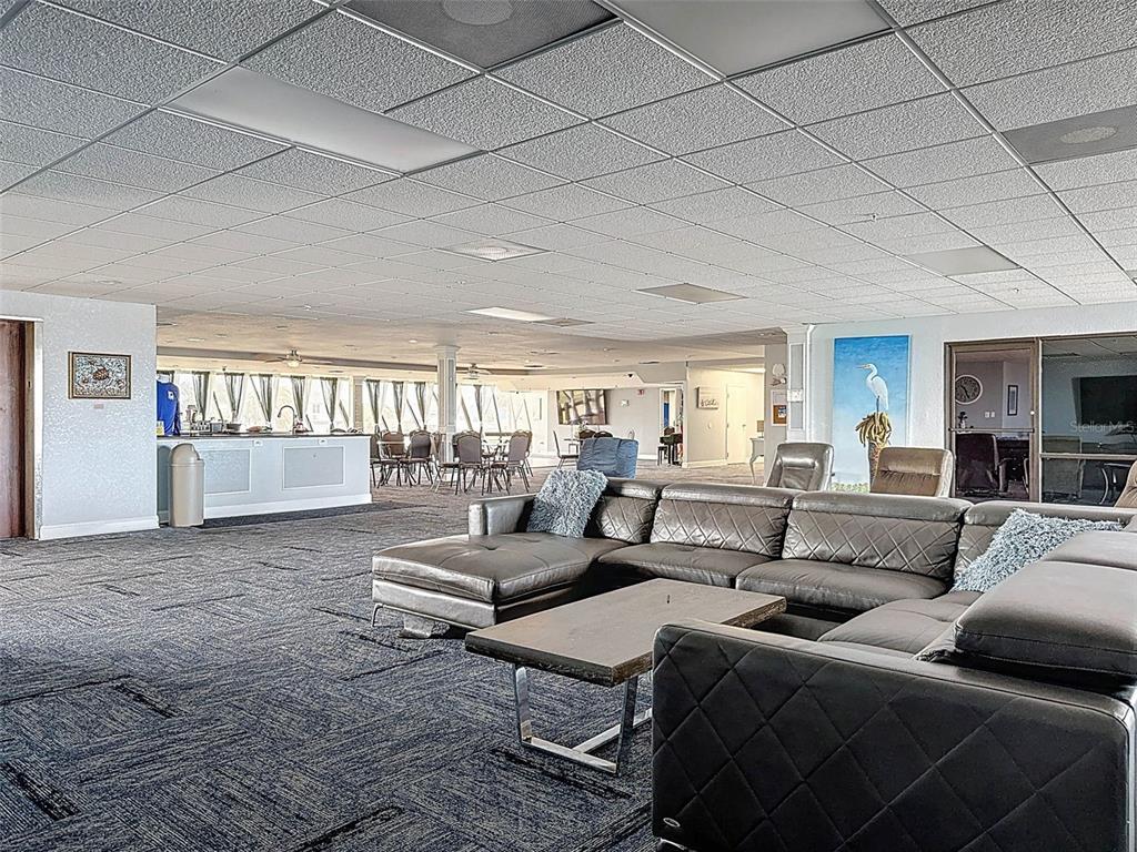 5915 Sea Ranch Drive, Unit 711 Hudson, FL 34667 - Photo 51 of 85 a living room with furniture and a wooden floor