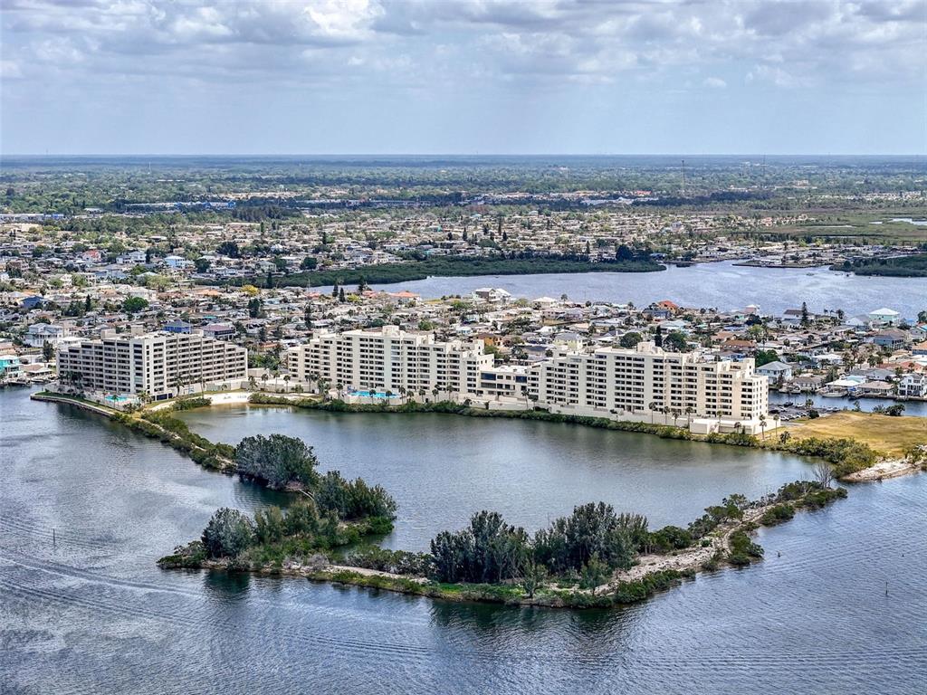 5915 Sea Ranch Drive, Unit 711 Hudson, FL 34667 - Photo 65 of 85 an aerial view of a city