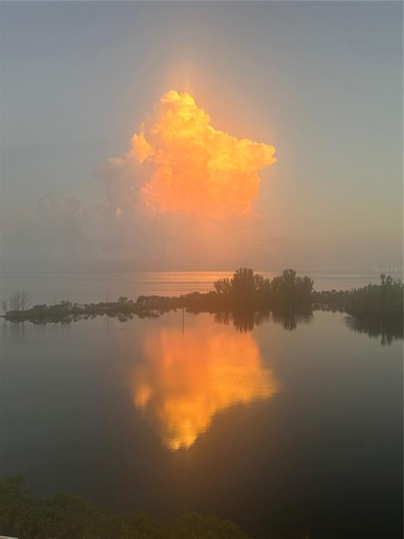 5915 Sea Ranch Drive, Unit 711 Hudson, FL 34667 - Photo 79 of 85 a view of an ocean and beach