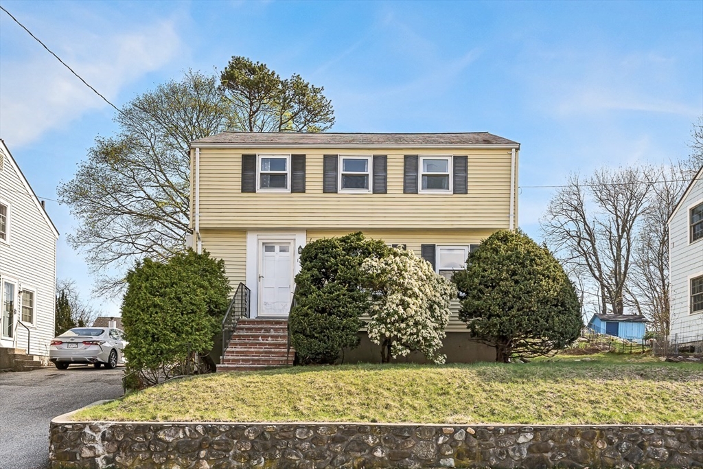 104 Wendell Street Winchester, MA 01890 - Photo 38 of 42 a view of a house with a yard