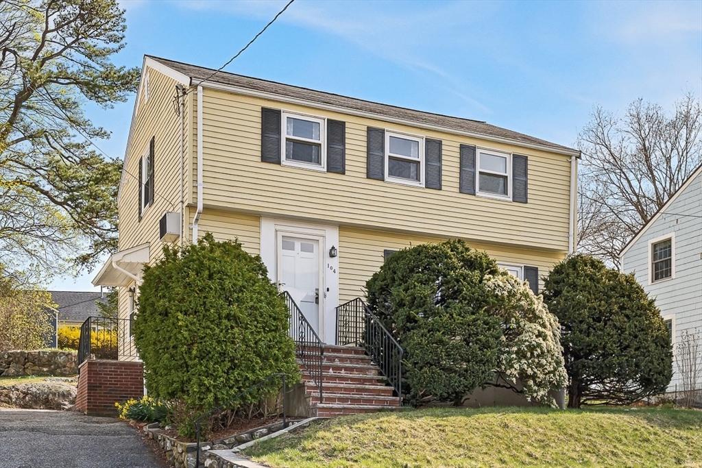 104 Wendell Street Winchester, MA 01890 - Photo 39 of 42 a front view of a house with garden