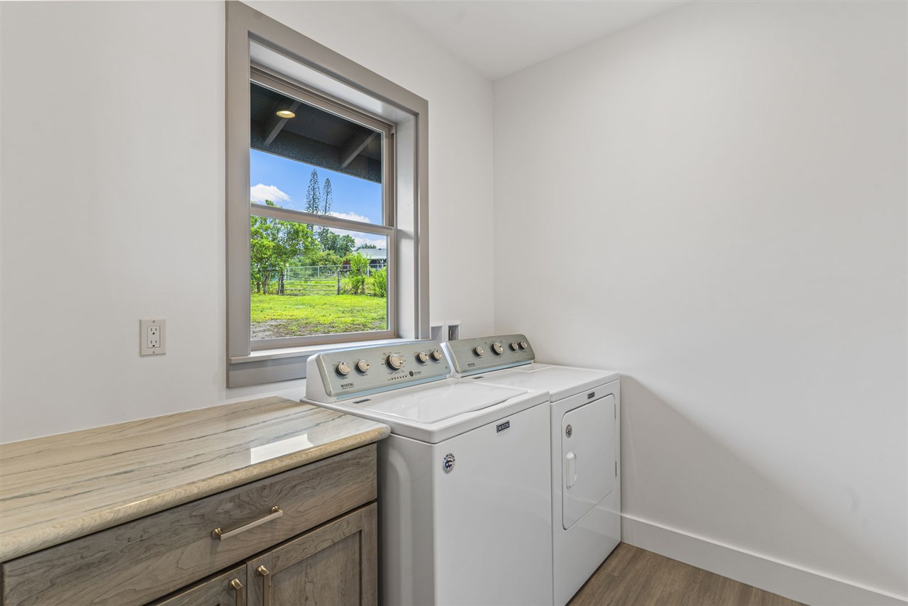 780 West Kuiaha Road Haiku, HI 96708 - Photo 15 of 30 a utility room with a sink dryer and window