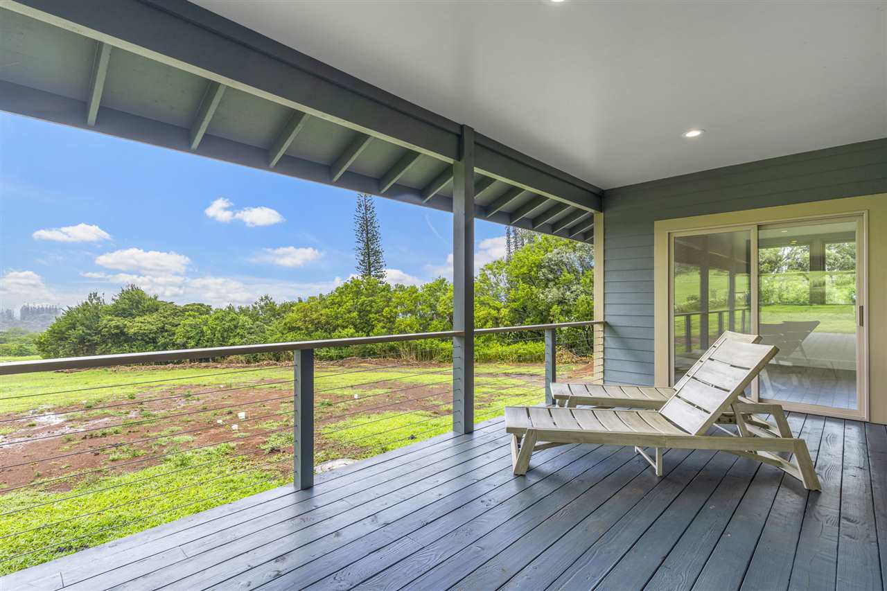 780 West Kuiaha Road Haiku, HI 96708 - Photo 2 of 30 a view of swimming pool with wooden floor