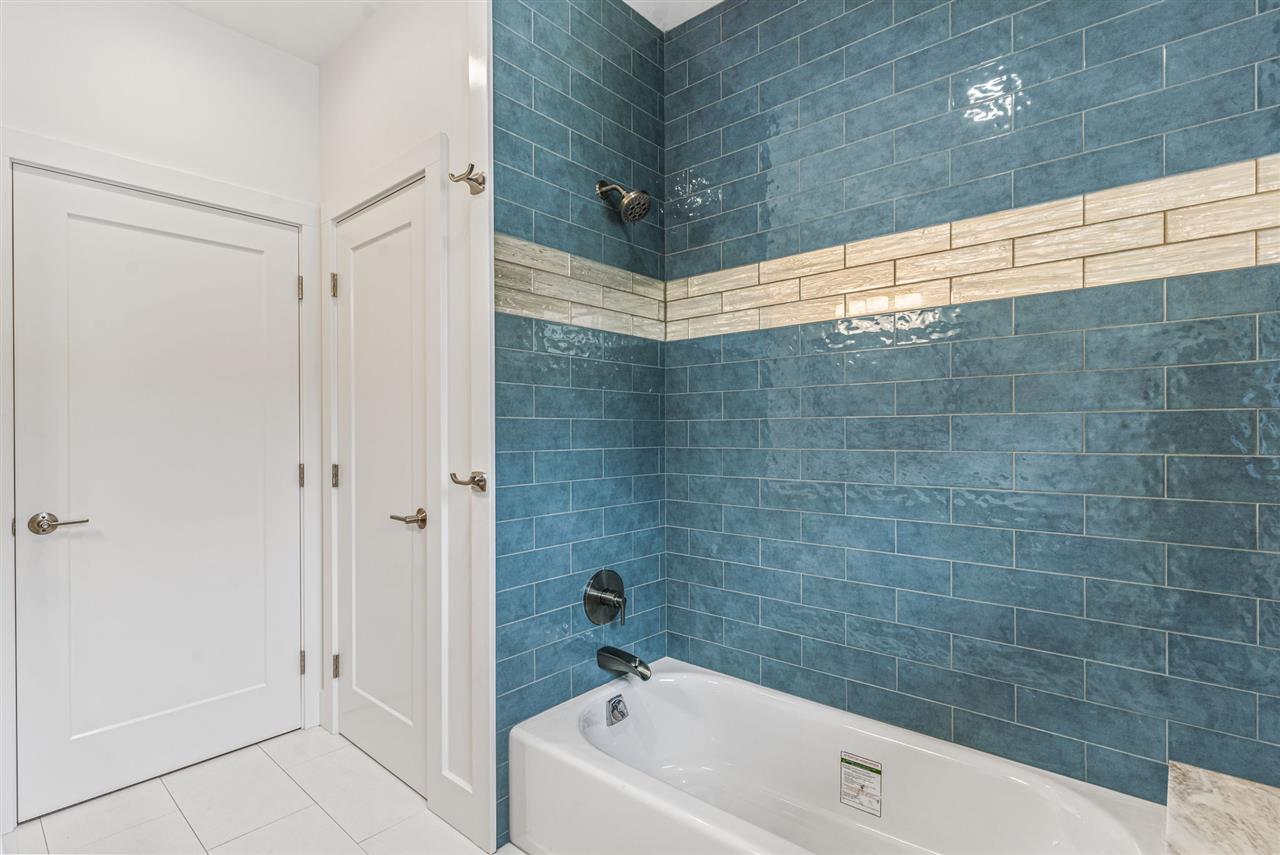 780 West Kuiaha Road Haiku, HI 96708 - Photo 26 of 30 a bathroom with a bathtub and shower