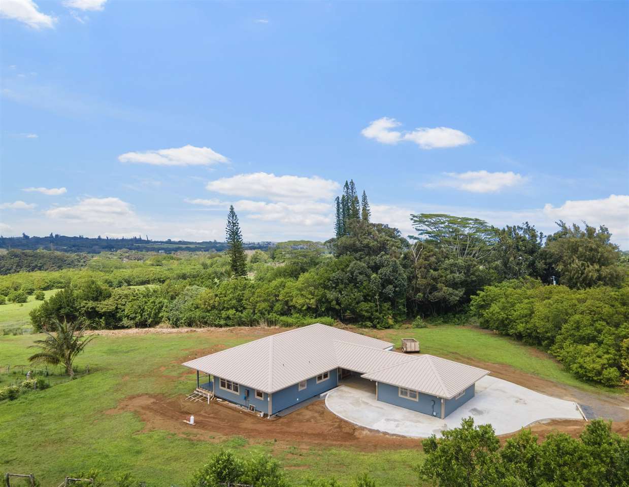 780 West Kuiaha Road Haiku, HI 96708 - Photo 3 of 30 a view of a big yard with potted plants